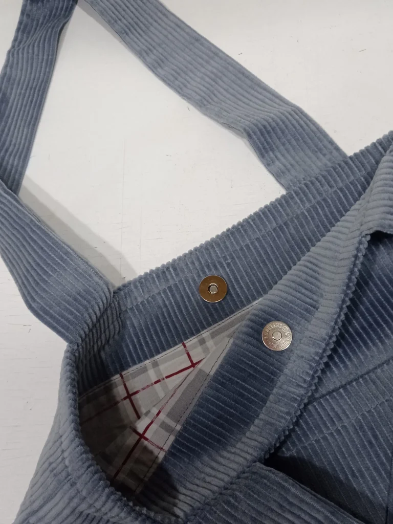 Système de fermeture du tote bag doublé